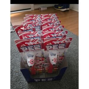 PEZ LOT OF 12 new pez dispensers target bullseye dog red white exp. 10/2029